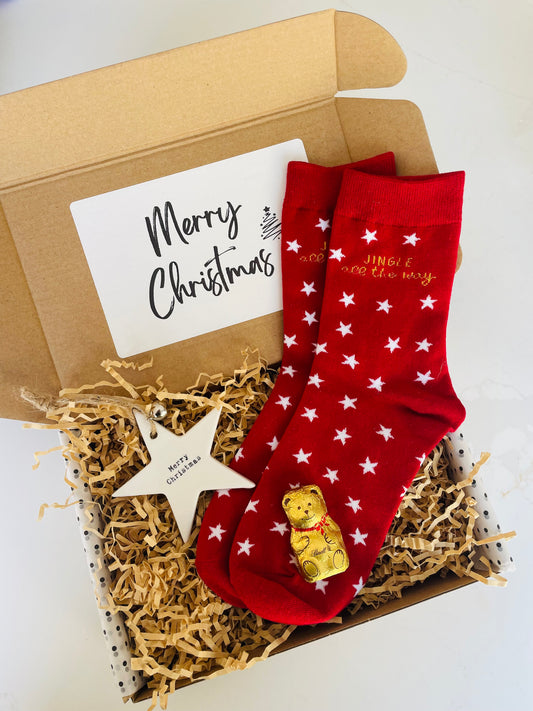 Christmas Mini Gift Box containing red star festive socks, mini lindt gold bear &  a beautifully embossed star decoration.  