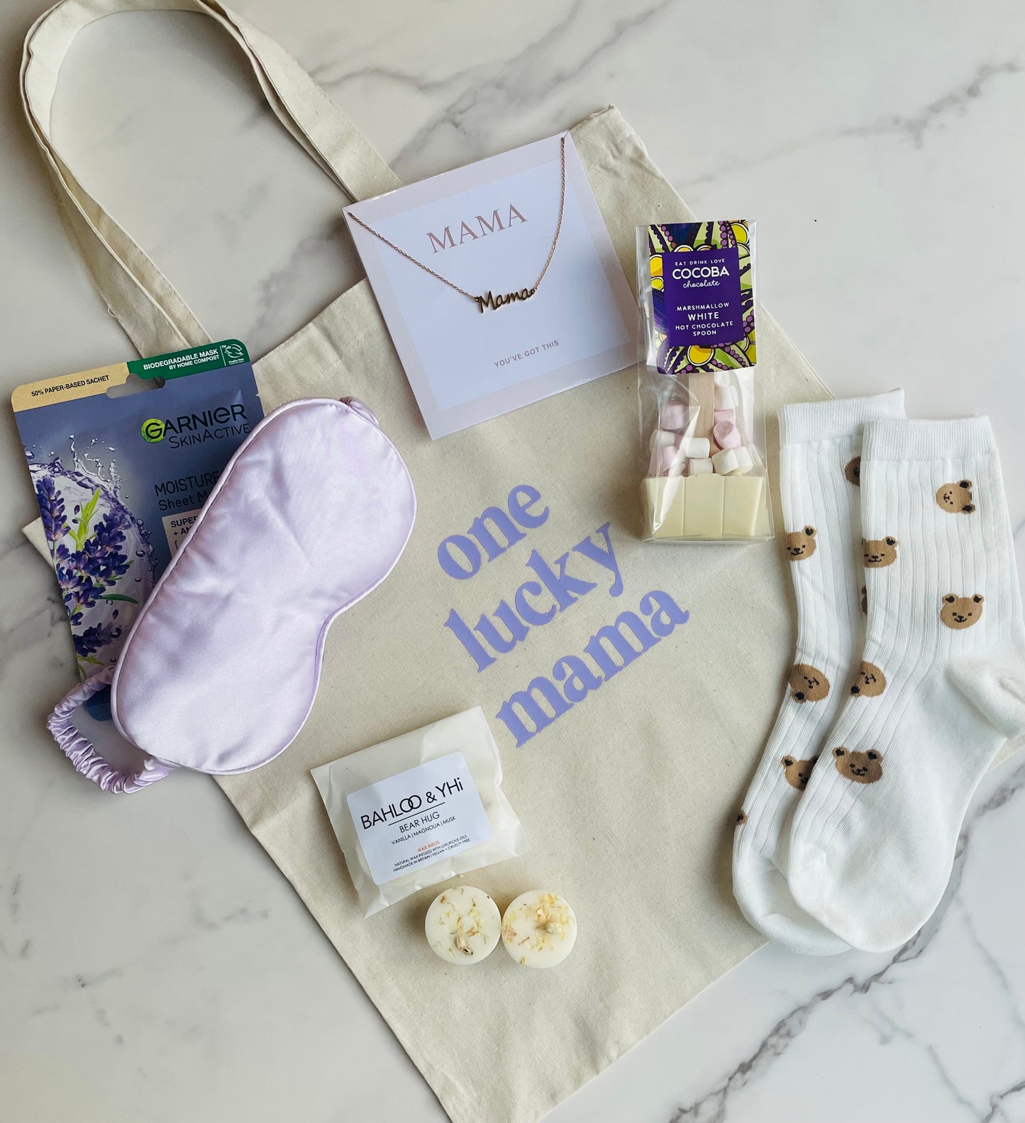 Tote bag with lilac writing, One Lucky Mama. 